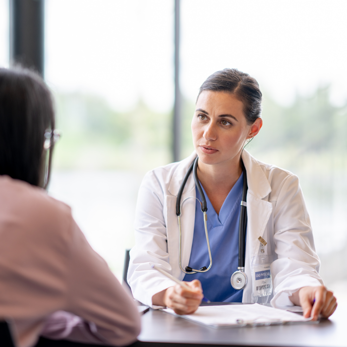 A doctor in discussion with a patient